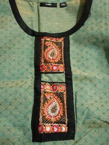 Green Embroidered Kurti with attractive design in