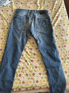Distressed Denim Jeans