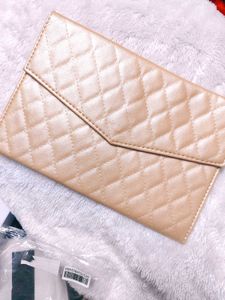 plum golden CLUTCH This refined  features