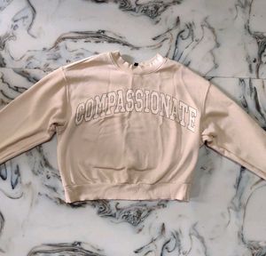 Compassionate Beige Sweatshirt