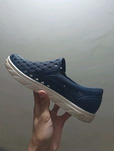 Srf Crossbond sports shoe on speaker