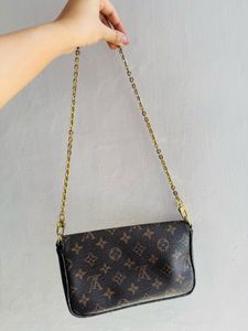 LV baguette cum Sling