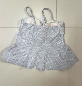 Embroidered Peplum Top