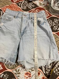 H&amp;M light blue washed ripped shorts