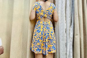 Forever 21. Floral Yellow Back Criss Cross  Dress