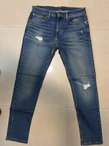 Distressed Denim Jeans