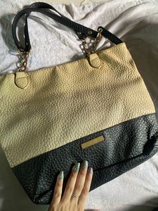 Vintage designer Christian Siriano handbag