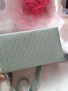 La Glory green sling bag