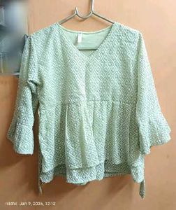 Embroidered Peplum Top