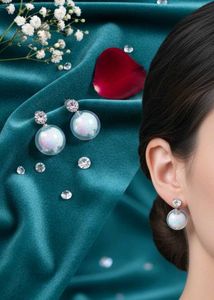 Two set of Earrings, hair bun net, bindi combo pac