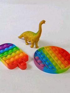 2 Pop It 1 Dinosaur Sligtly Used