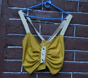 Hardly worn mustard yellow crop top .