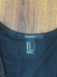 Black and golden shimmery dress in size M