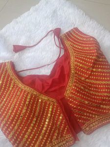 Red Sleeveless Blouse