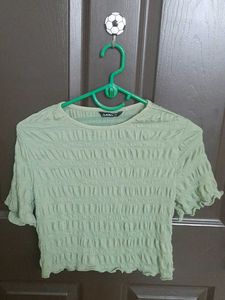 Green Textured Crop Top the size is medium