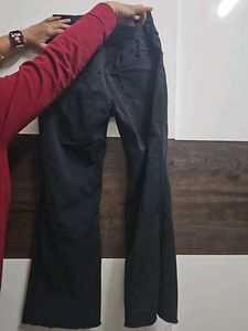 Charcoal coloured bootcut denim jean