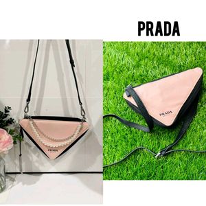 Prada original iconic triangle sling bag