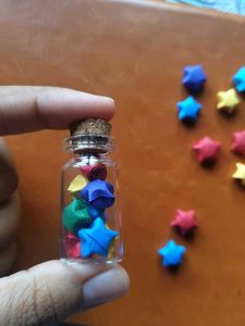 Glass Jars Filled With Paper Stars