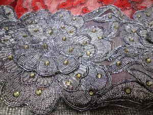 Red fancy saree worth 2K