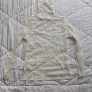 sheer turtleneck lace