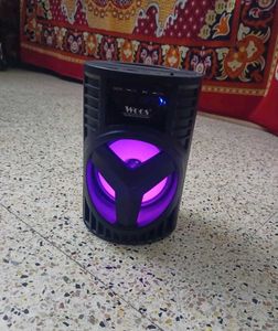 Woos Speaker