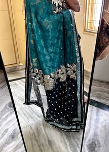 Designer Turquoise Green Saree With Black Net