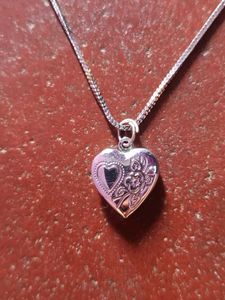 Locket Neck Piece, Black Metal Earrings.