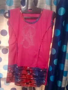 Red Sleeveless Top with Embellishments