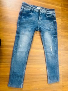 Distressed Slim Fit Jeans