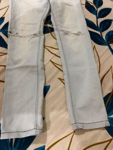 Distressed Light Wash High-Waisted Jeans