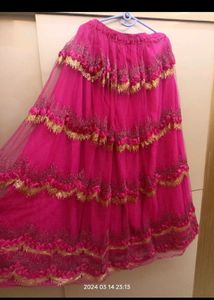 Golden choli and pink ghaghra with dupatta