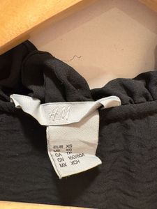 H&amp;M Chic Black ruffle Neck Top