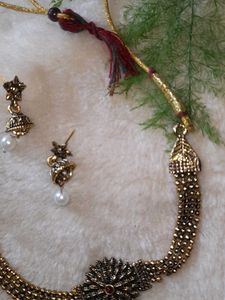 Neckpiece And Earpiece