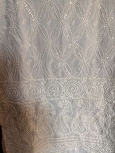 Elegant White Embroidered Kurti