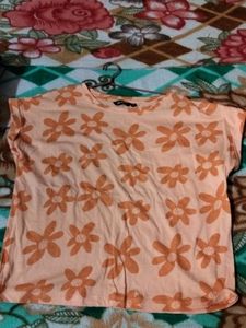 bust size 30 ... orange colour... floral flower print....