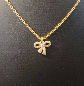 Gold Bow Knot Pendant Necklace
