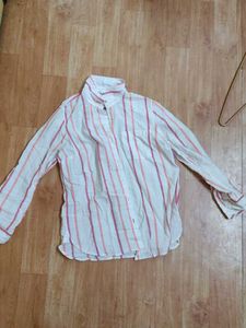 Stylish White Shorts with Bold Orange Lining – Spo