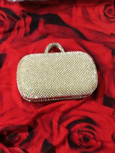 golden daimon clutch