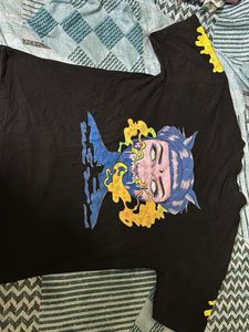 Unique black graphic tee with eye-catching detail