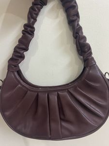 a beautiful chocolate-ish coffee brown sling bag
