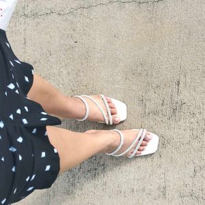 white , sparky heels