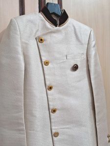 Cream Textured Sherwani with Velvet Collar