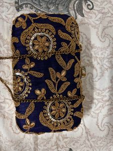 Embroidered box clutch