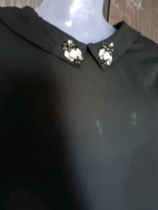 Black Sleeveless Top with Embellished Collar