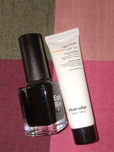 combo of sunscreen and nail paint black