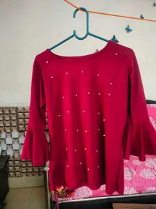 Red bell sleeve top