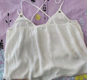 sleeveless top ,bust size-36,goes well on jeans and skirts