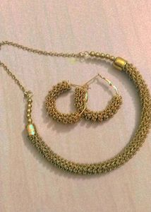 Golden Earrings And Necklace