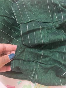 Dark Bottle Green Kurti On Hands Stitches Opened But Not Torn