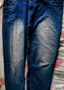 Distressed Blue Denim Jeans
